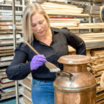 NCAM staff working on an artifact 